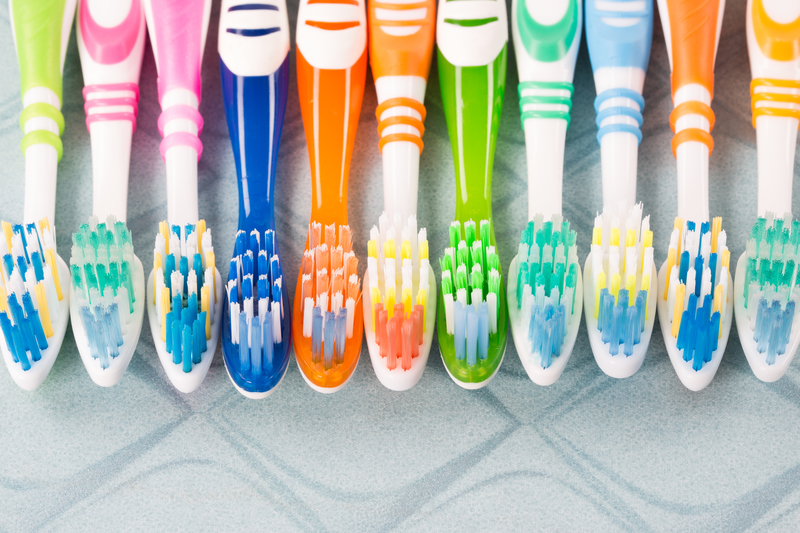 Picture of seven different toothbrushes