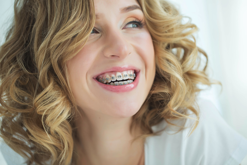 Woman smiling with braces